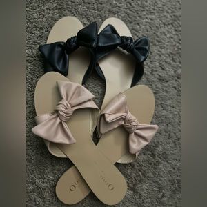 Two pairs of never worn sandals.
